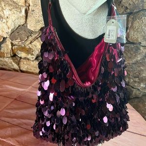 Purple sequenced purse